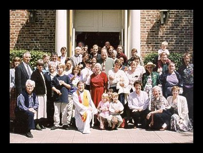 Members & friends of Berkeley's
    First Baptist in front of their church's open doors