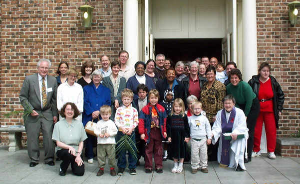 Members & 
    friends of Berkeley's First Baptist in front of their 
    church's open doors